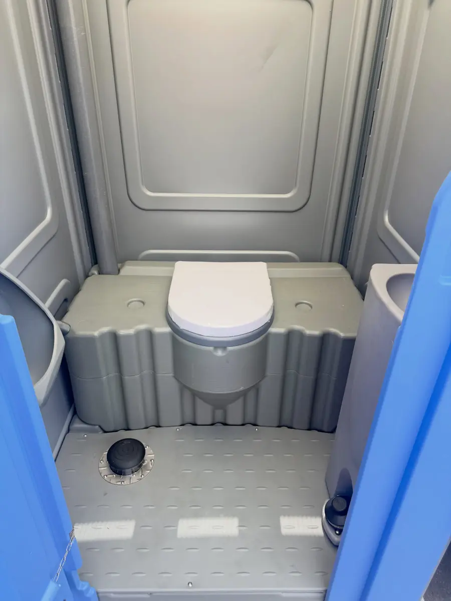 Clean, roomy interior of a portable toilet